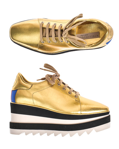 Sneakers Stella McCartney oro M: Stile elegante e comfort per la fashionista moderna.